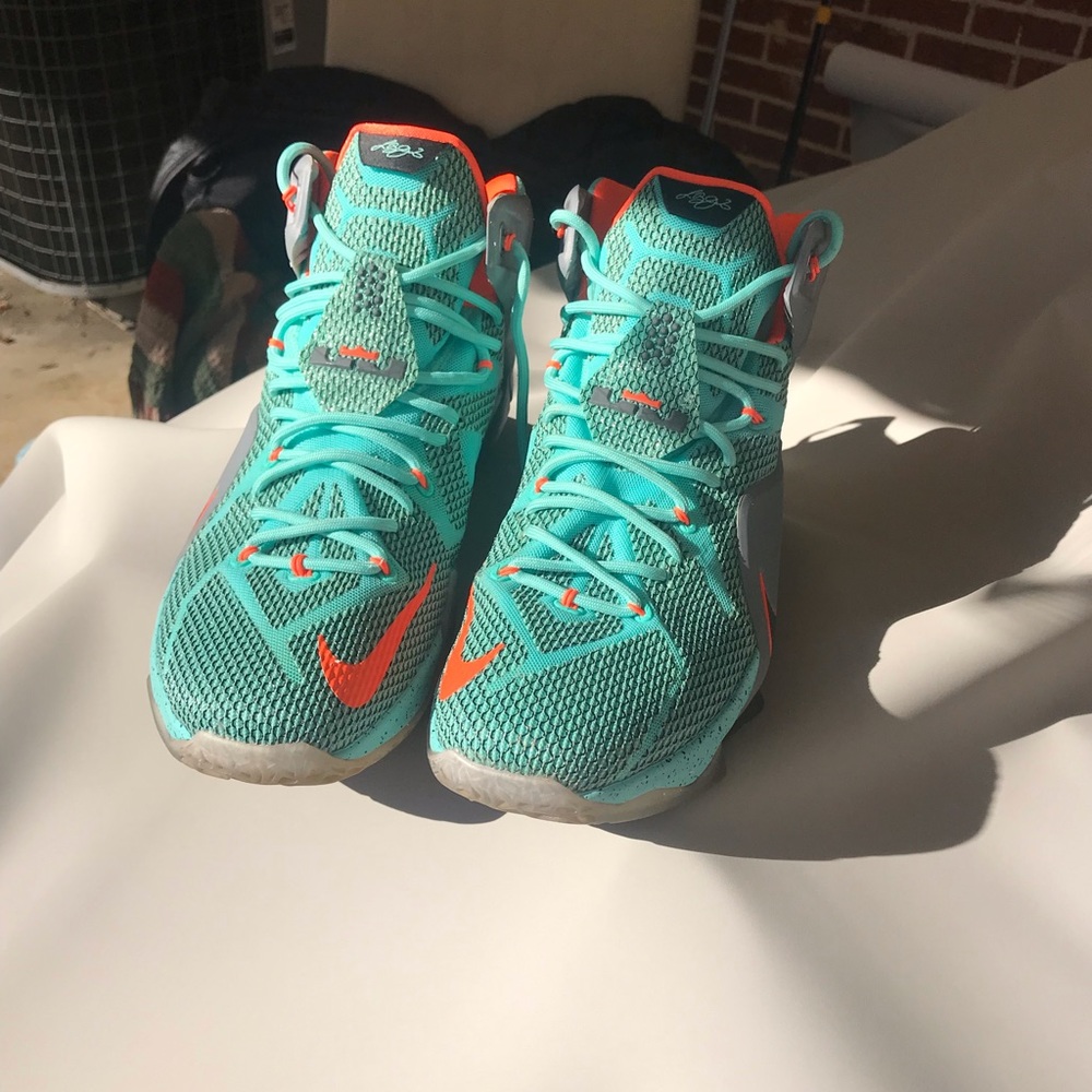 LeBron James Nikes teal and orange